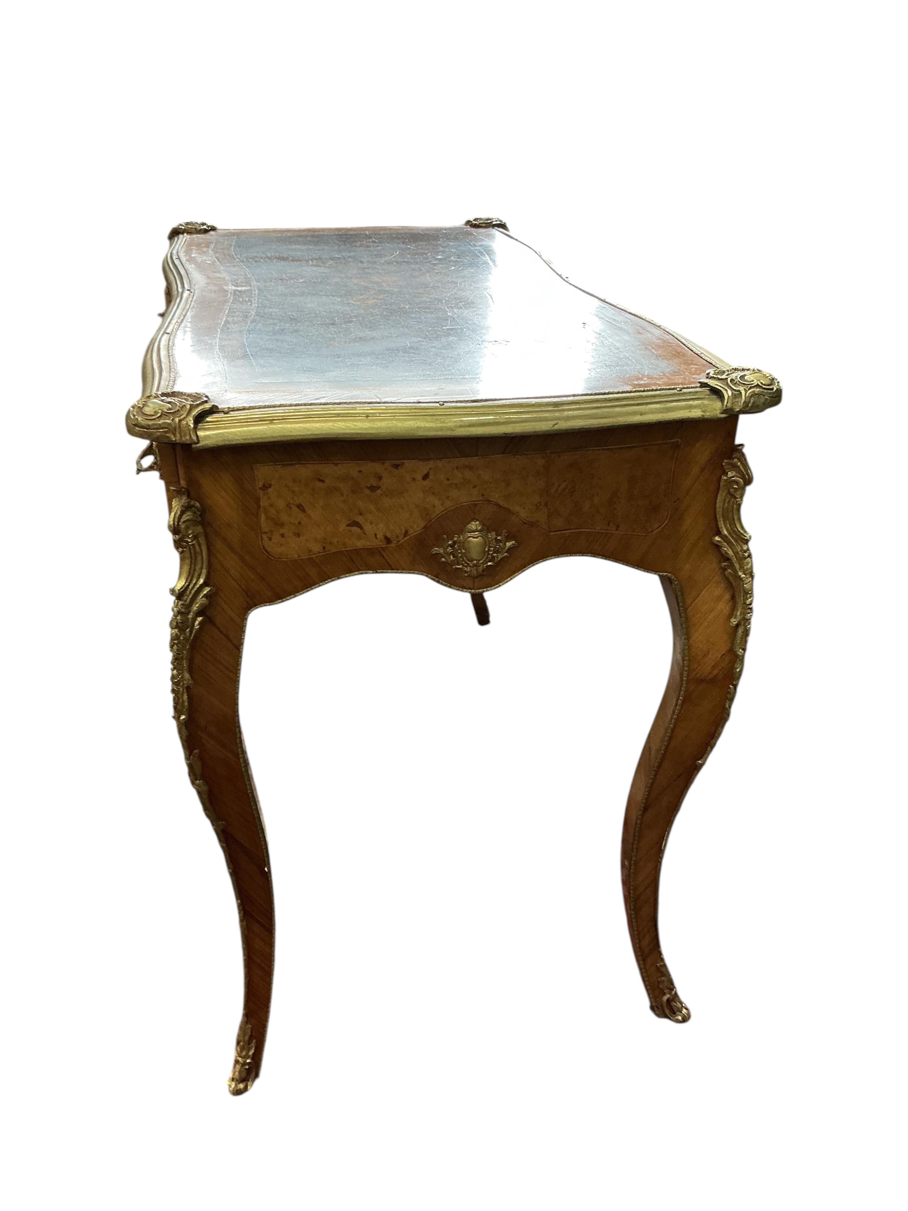 A Louis XVI style gilt metal mounted kingwood bureau plat, width 102cm, depth 55cm, height 80cm
